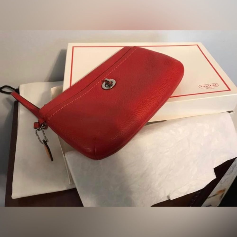 Red leather Coach clutch/wristlet